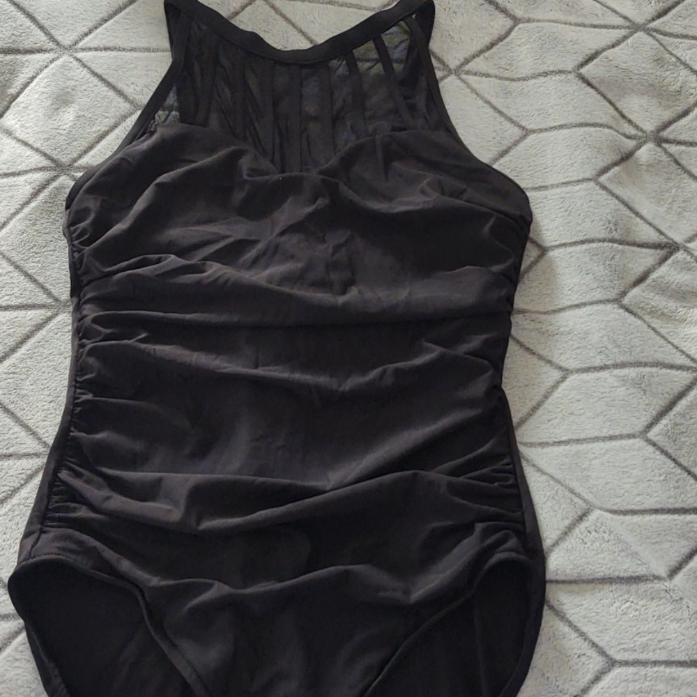 Tummy flattering one piece bathing suit !